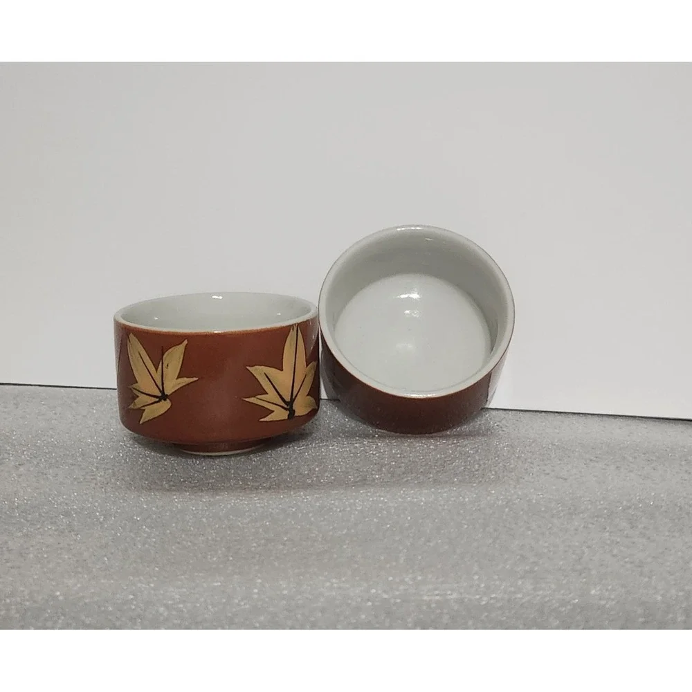 vintage ceramic tea bowls featuring an autumn maple leaf pattern